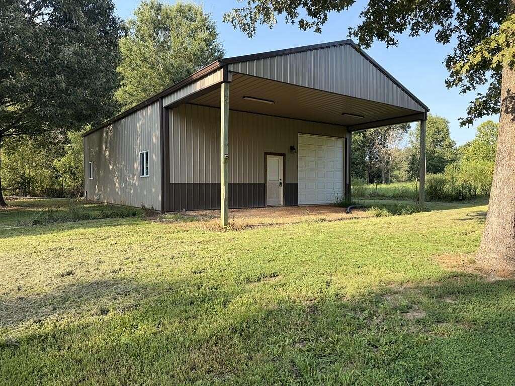 11 Acres of Land with Home for Sale in Gleason, Tennessee
