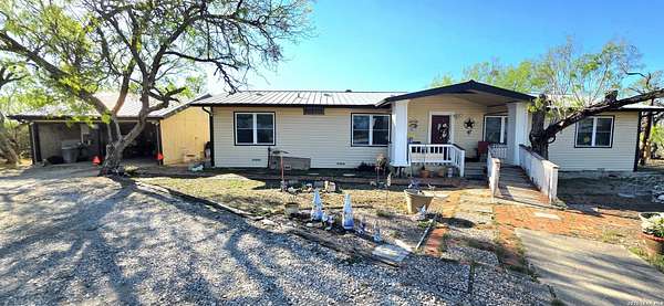 10 Acres of Land with Home for Sale in Floresville, Texas