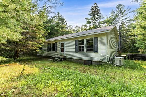 5.6 Acres of Land with Home for Sale in Levering, Michigan