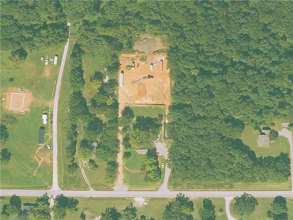 3 Acres of Land with Home for Sale in Gravette, Arkansas