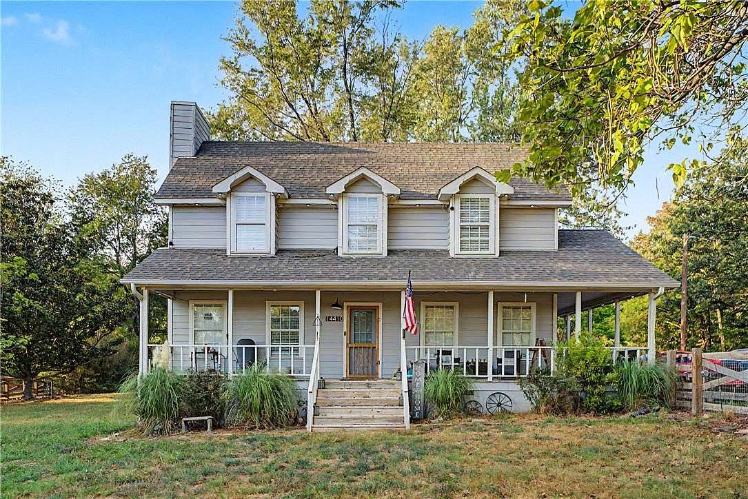3 Acres of Land with Home for Sale in Gravette, Arkansas