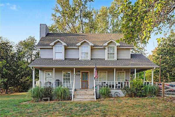 3 Acres of Land with Home for Sale in Gravette, Arkansas