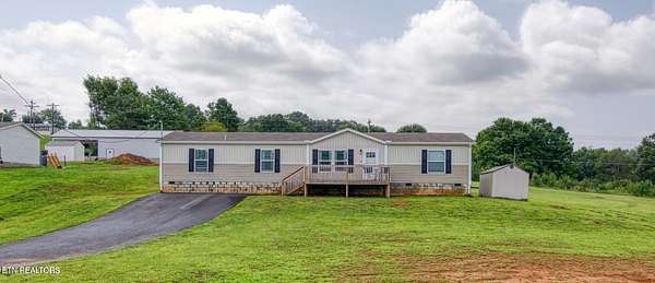 1.5 Acres of Land with Home for Sale in Dandridge, Tennessee