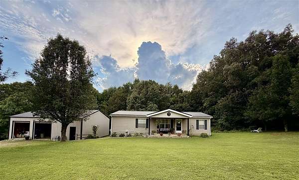 1.4 Acres of Land with Home for Sale in Scottsville, Kentucky