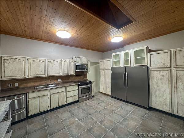5 Acres of Land with Home for Sale in Versailles, Missouri