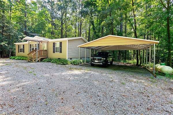 19.9 Acres of Recreational Land with Home for Sale in Waverly, Virginia
