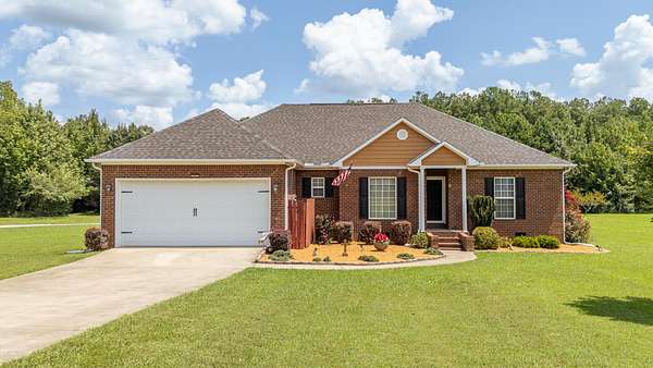 5 Acres of Land with Home for Sale in Adamsville, Tennessee