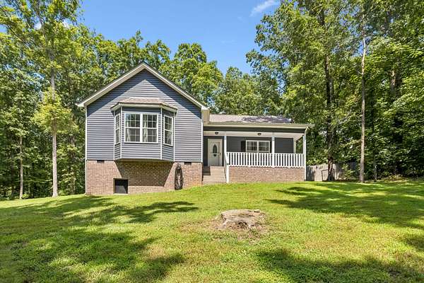 1.73 Acres of Land with Home for Sale in White Bluff, Tennessee