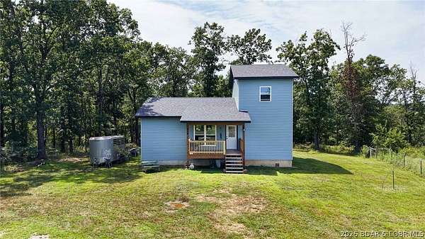 6.22 Acres of Land with Home for Sale in Camdenton, Missouri