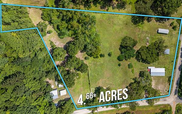 4.66 Acres of Land with Home for Sale in Laurel Hill, Florida