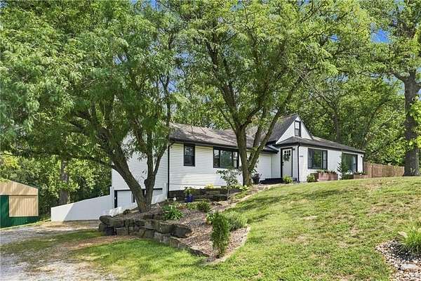 14.9 Acres of Recreational Land with Home for Sale in Platte City, Missouri