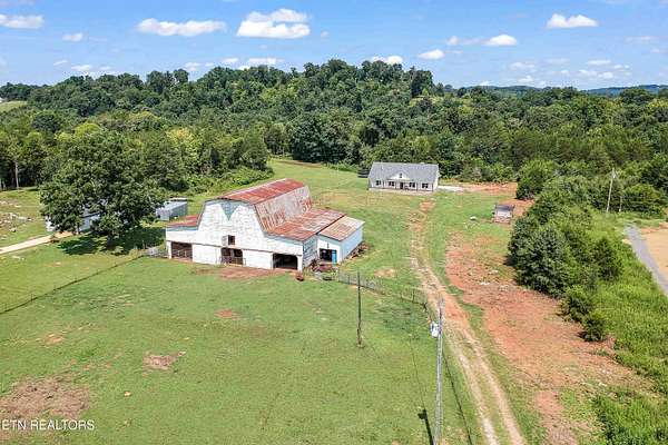 5 Acres of Land with Home for Sale in Dandridge, Tennessee