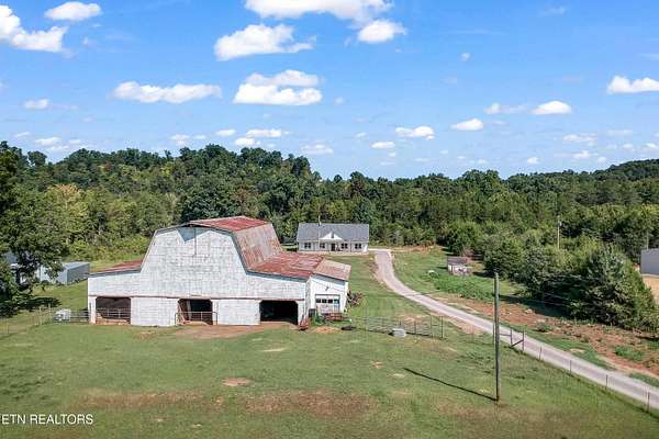 5 Acres of Land with Home for Sale in Dandridge, Tennessee