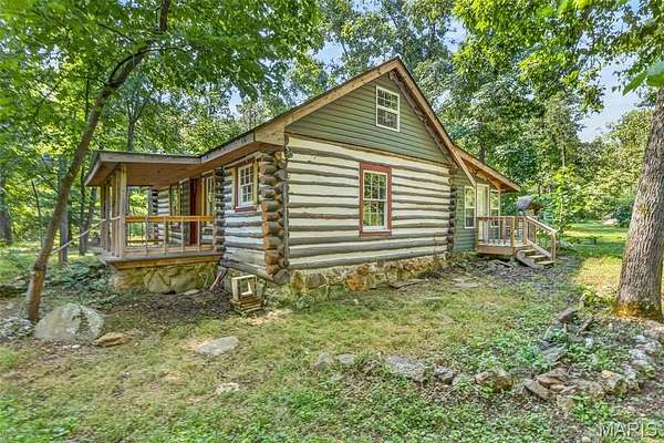 15.5 Acres of Recreational Land with Home for Sale in Liberty Township, Missouri