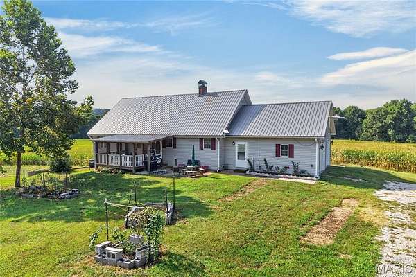 75.1 Acres of Land with Home for Sale in Richland, Missouri
