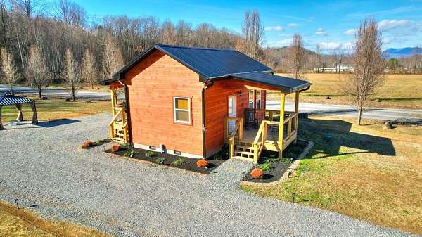 0.77 Acres of Land with Home for Sale in Cosby, Tennessee