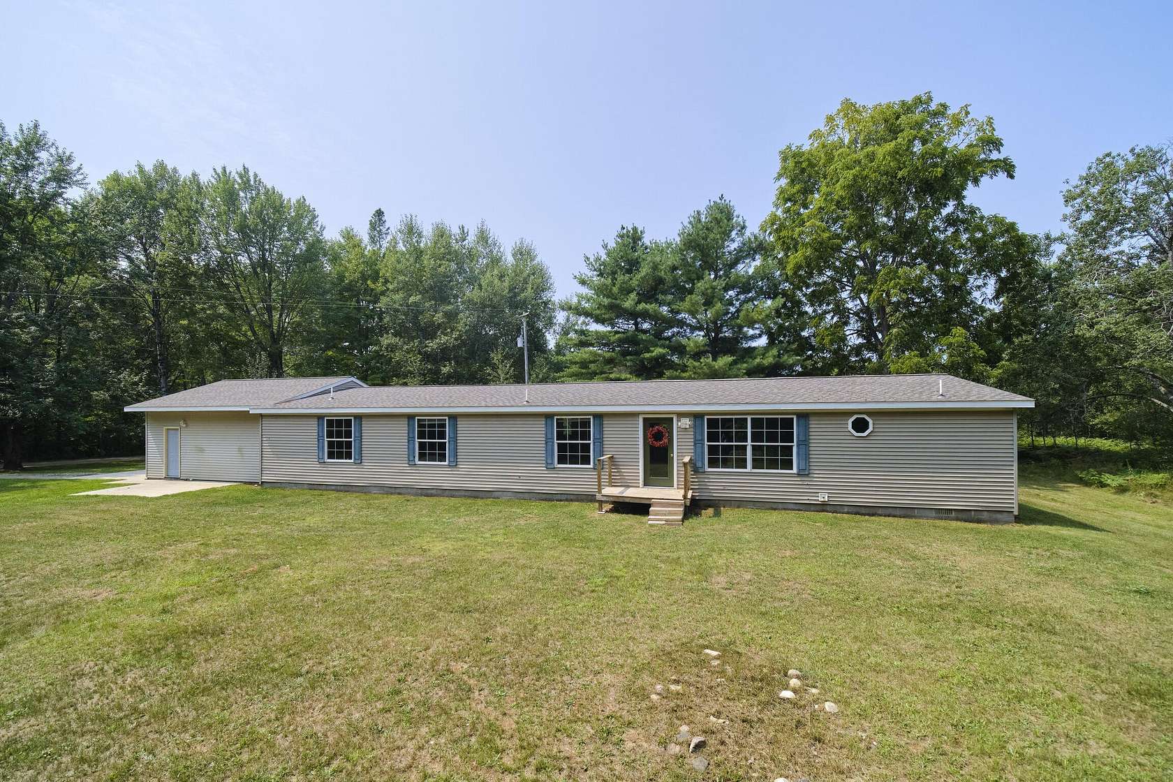 6.32 Acres of Land with Home for Sale in Kaleva, Michigan