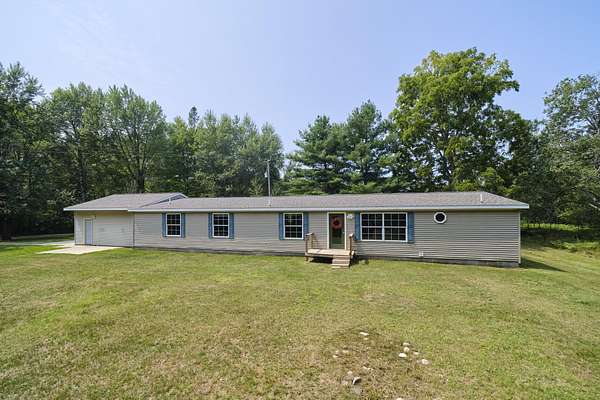 6.32 Acres of Land with Home for Sale in Kaleva, Michigan