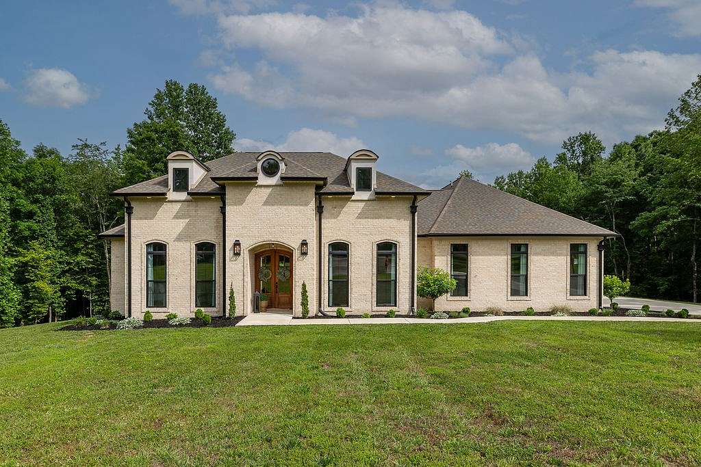 9.47 Acres of Land with Home for Sale in Leoma, Tennessee