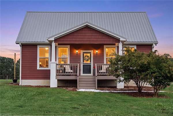 7.14 Acres of Land with Home for Sale in Snow Camp, North Carolina