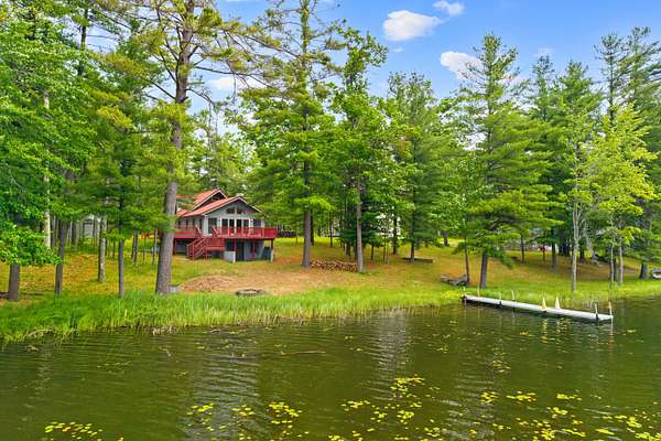 1.5 Acres of Land with Home for Sale in Lewiston, Michigan