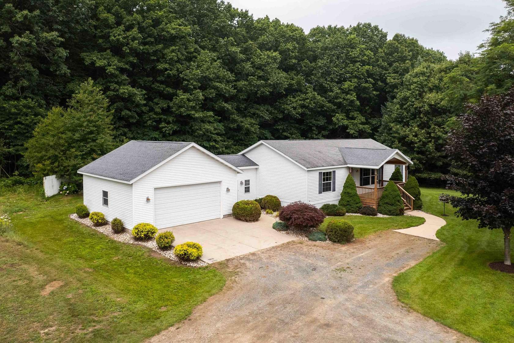 5 Acres of Land with Home for Sale in New Era, Michigan