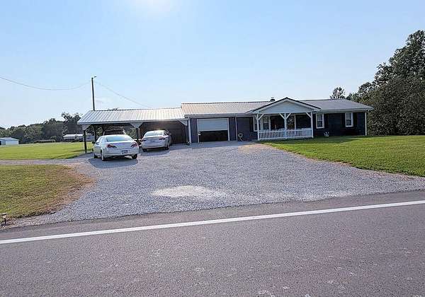 3 Acres of Land with Home for Sale in Crab Orchard, Kentucky