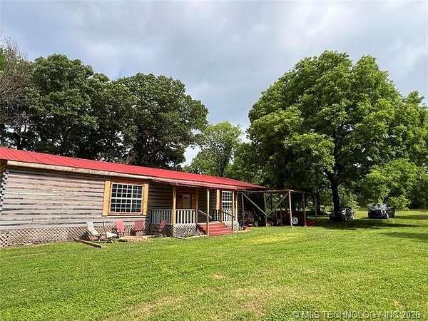 6.81 Acres of Land with Home for Sale in Jennings, Oklahoma