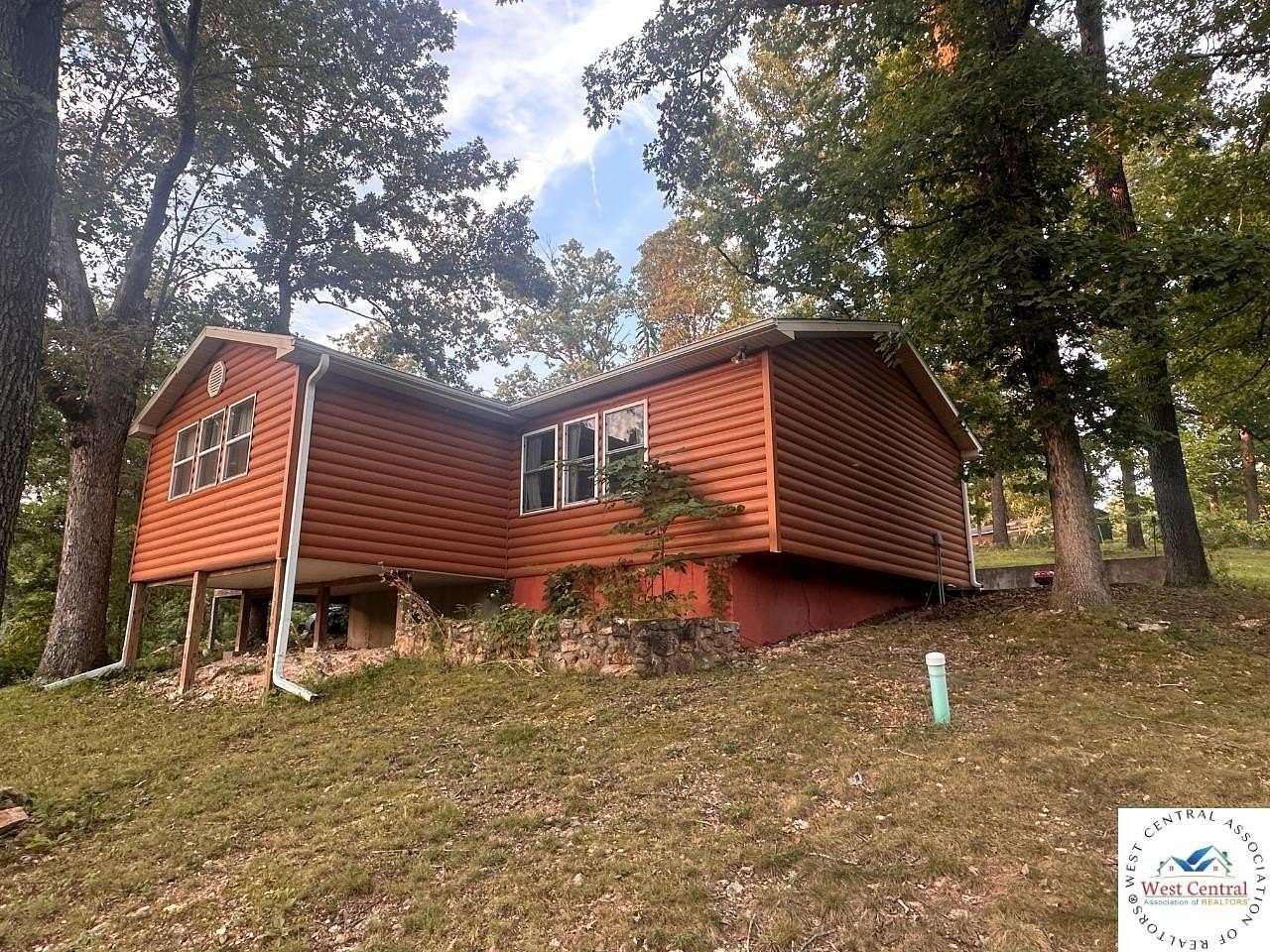 11.1 Acres of Land with Home for Sale in Barnett, Missouri