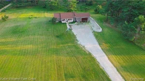 10.7 Acres of Recreational Land with Home for Sale in Hillman Township, Michigan