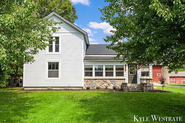 3 Acres of Land with Home for Sale in Rockford, Michigan