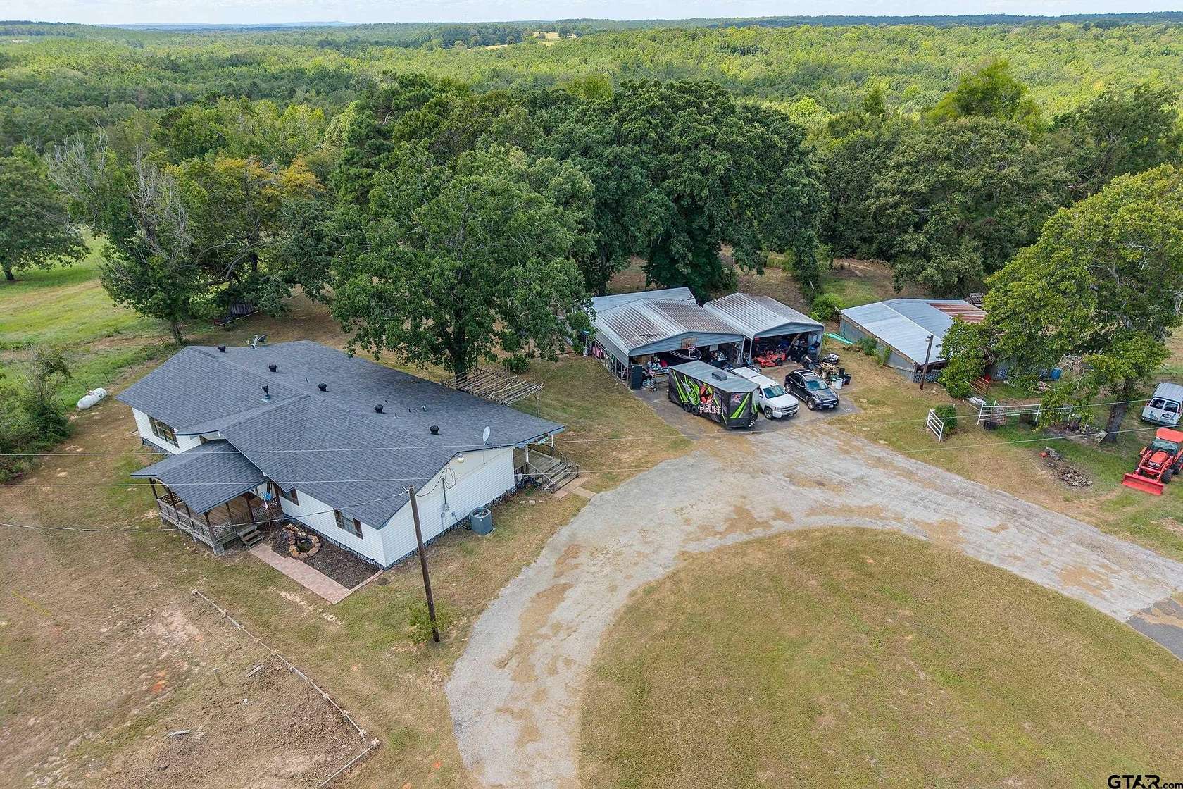 60.6 Acres of Land with Home for Sale in Henderson, Texas