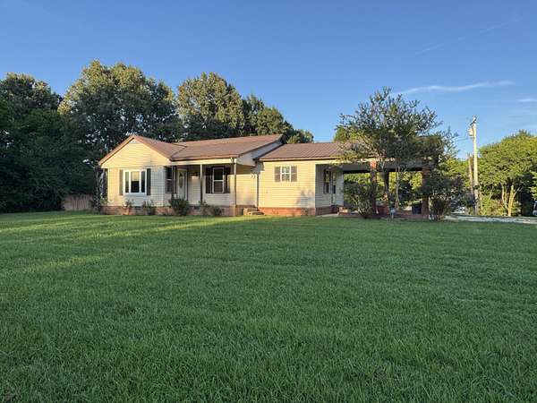 4.75 Acres of Land with Home for Sale in Plantersville, Mississippi