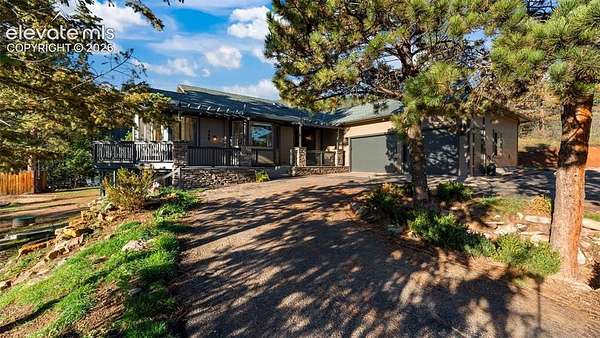 2.63 Acres of Land with Home for Sale in Woodland Park, Colorado