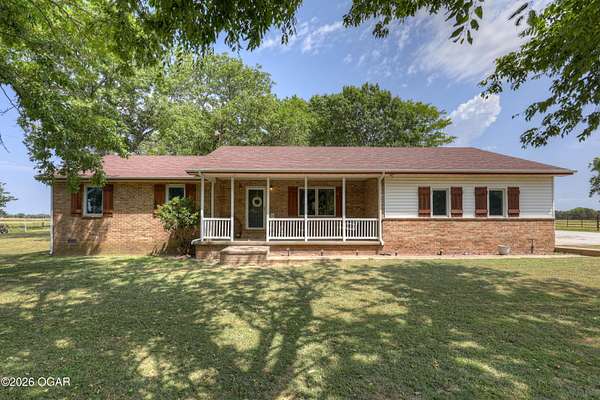 2.89 Acres of Land with Home for Sale in Carthage, Missouri