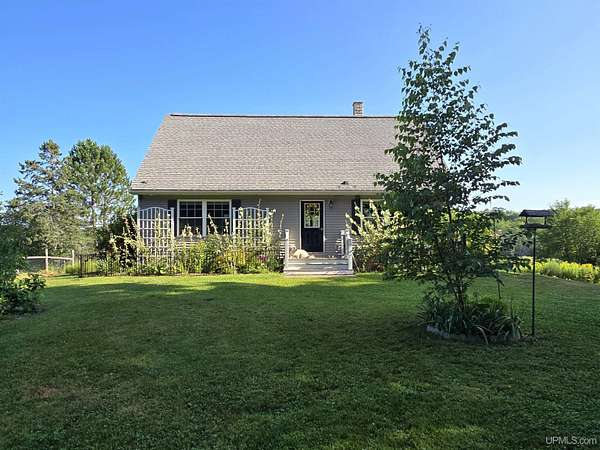 36 Acres of Land with Home for Sale in Eben Junction, Michigan
