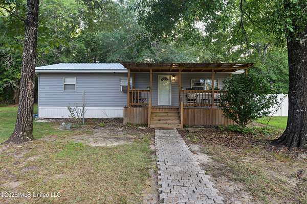 1.6 Acres of Land with Home for Sale in Wiggins, Mississippi
