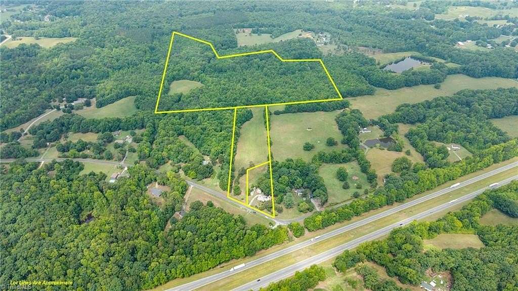 35.6 Acres of Land with Home for Sale in Julian, North Carolina