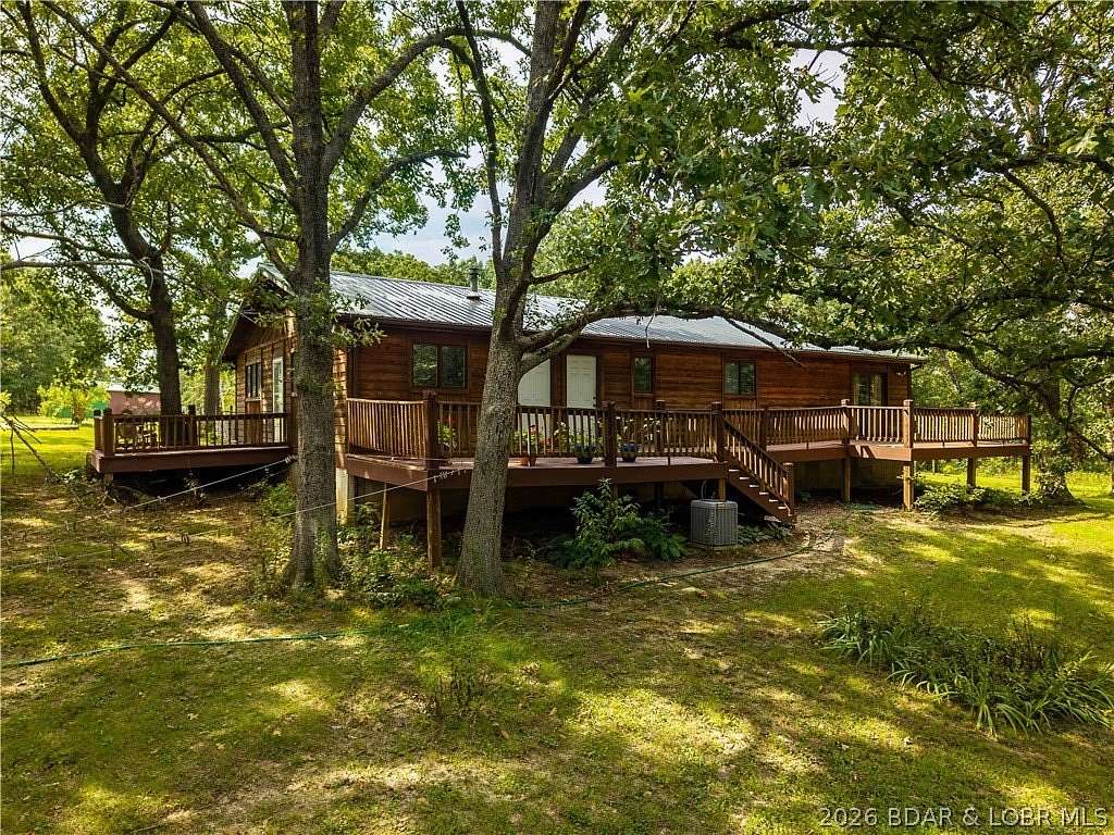 15.9 Acres of Land with Home for Sale in Gravois Mills, Missouri