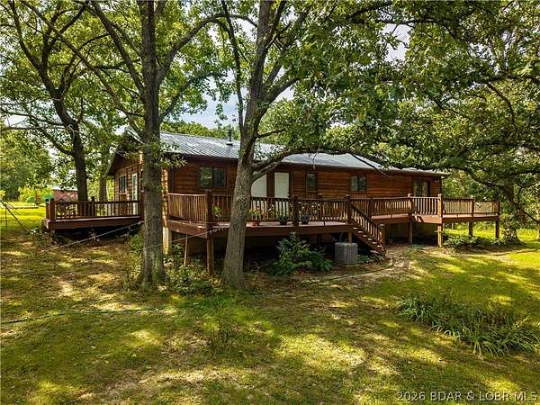 15.9 Acres of Land with Home for Sale in Gravois Mills, Missouri