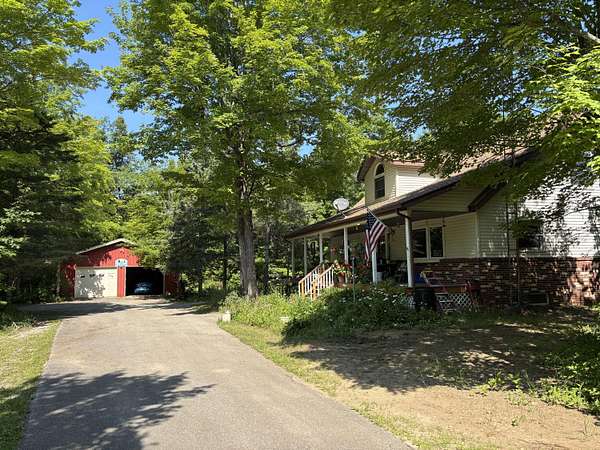 160 Acres of Land with Home for Sale in Presque Isle, Michigan
