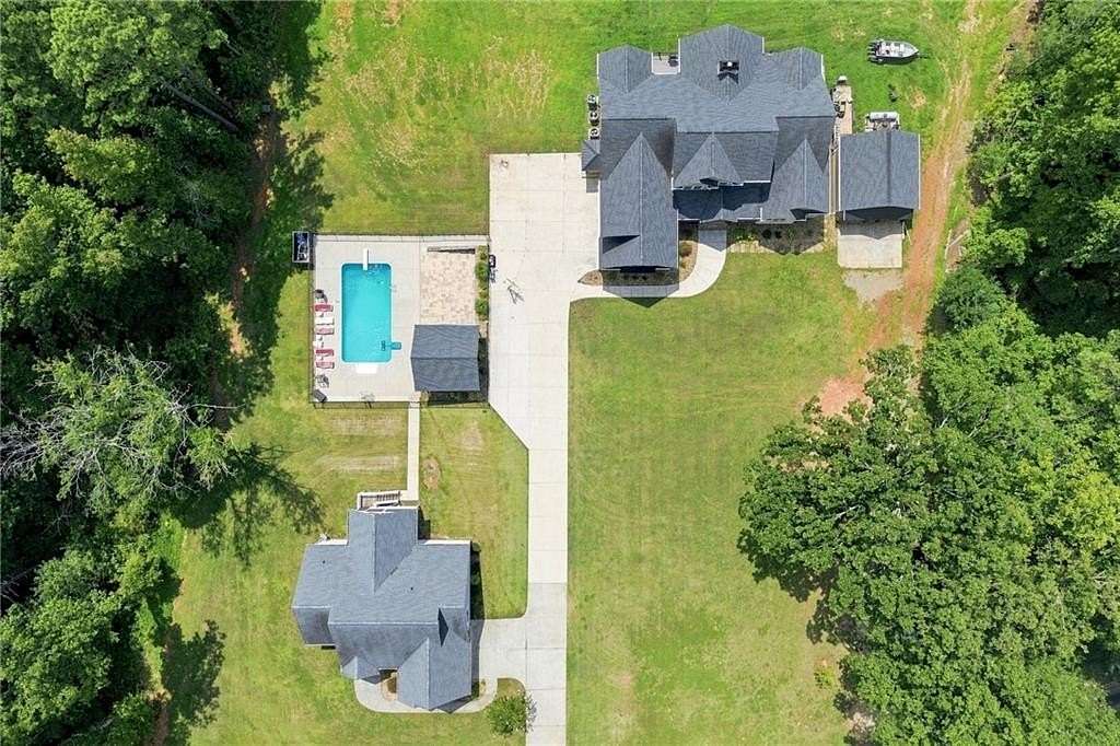 11.6 Acres of Land with Home for Sale in Ball Ground, Georgia