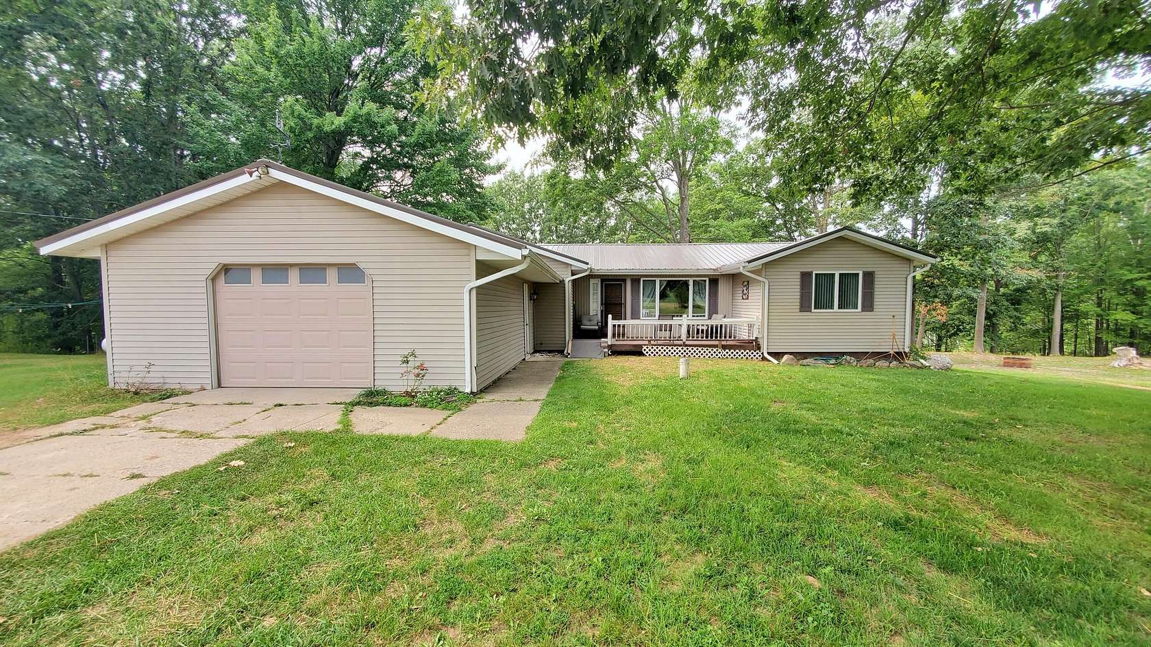 10.5 Acres of Land with Home for Sale in Evart, Michigan