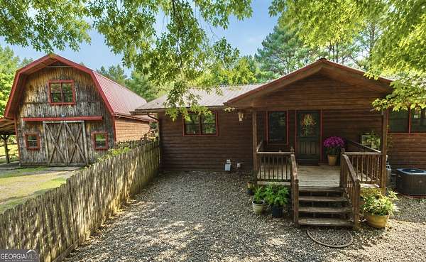 4.86 Acres of Land with Home for Sale in Morganton, Georgia