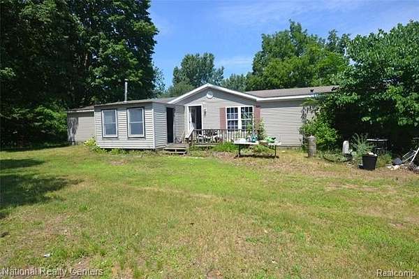 3.2 Acres of Land with Home for Sale in Columbia Township, Michigan