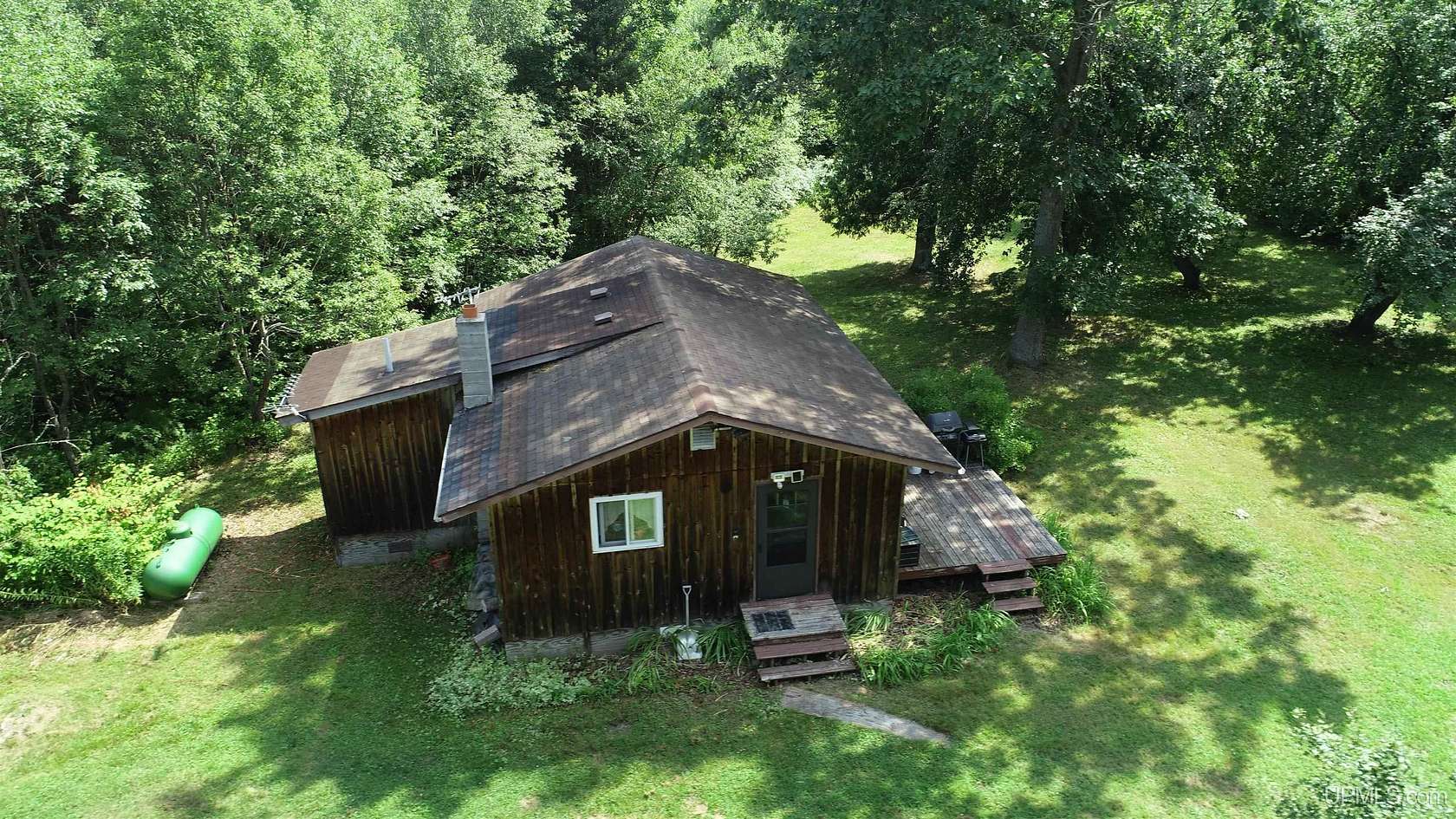 36.7 Acres of Recreational Land with Home for Sale in Rock, Michigan