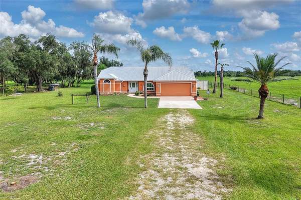 125 Acres of Land with Home for Sale in Fort Meade, Florida