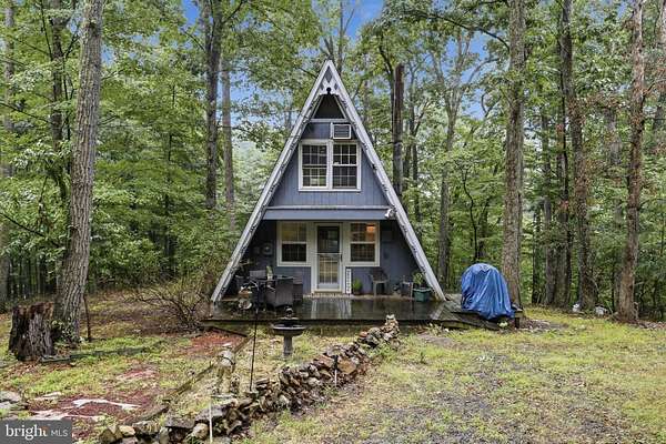 5 Acres of Land with Home for Sale in Great Cacapon, West Virginia