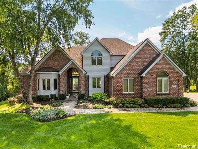 3 Acres of Land with Home for Sale in Highland Township, Michigan