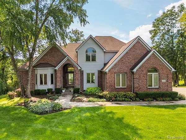 3 Acres of Land with Home for Sale in Highland Township, Michigan